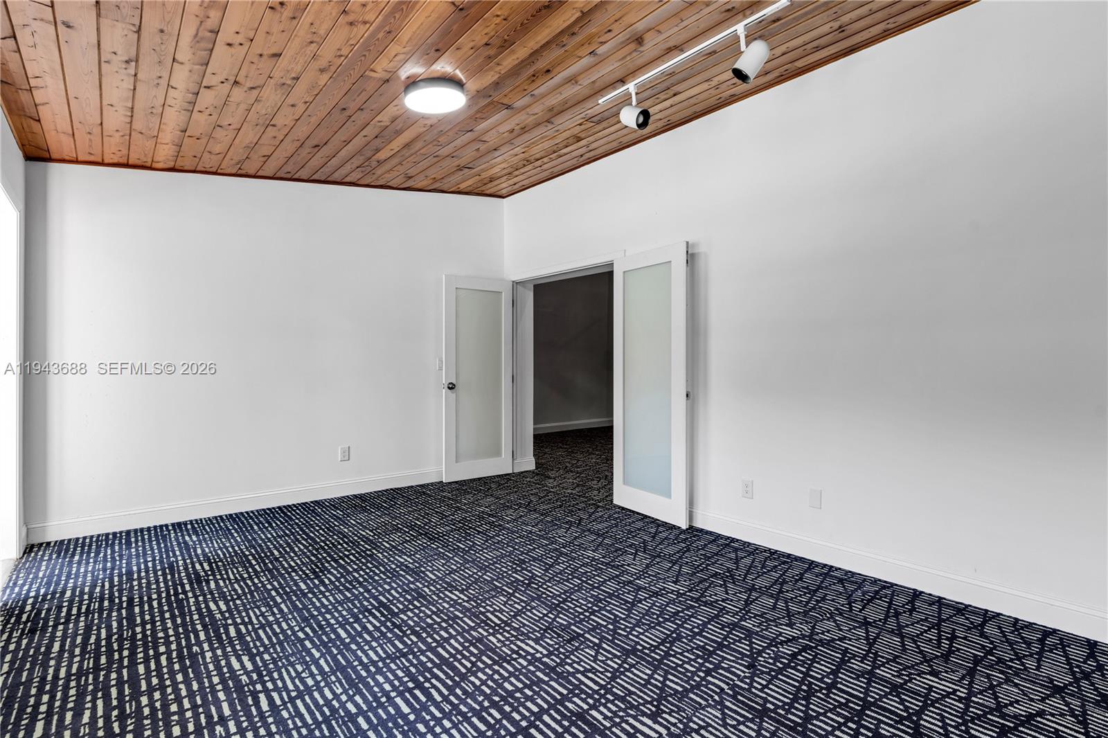 12525 Southwest 68th Court Pinecrest, FL 33156 - Photo 32 of 46 a view of a hallway