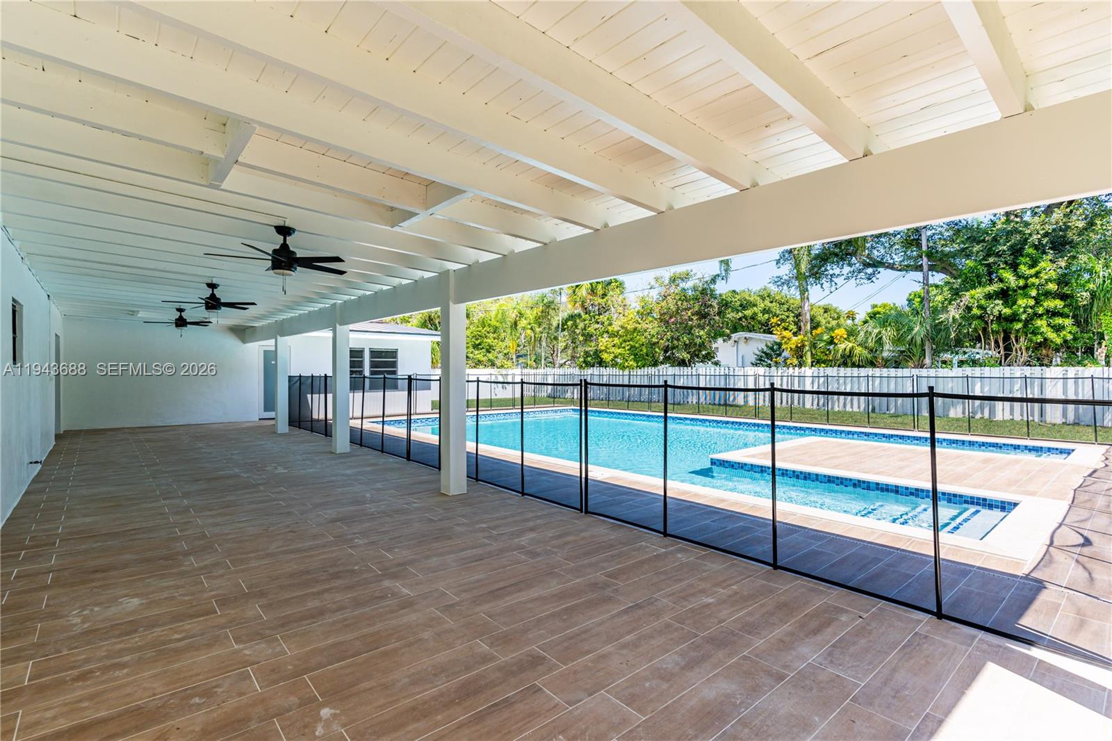 12525 Southwest 68th Court Pinecrest, FL 33156 - Photo 33 of 46 a view of a backyard