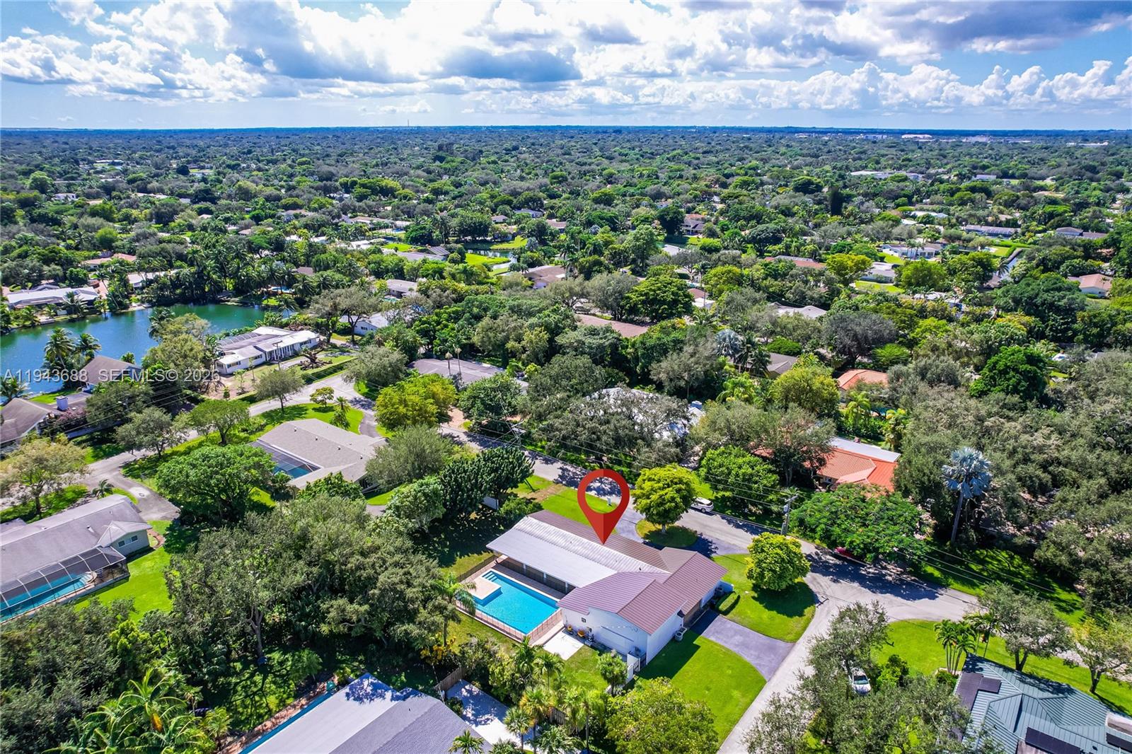 12525 Southwest 68th Court Pinecrest, FL 33156 - Photo 5 of 46 a view of a city