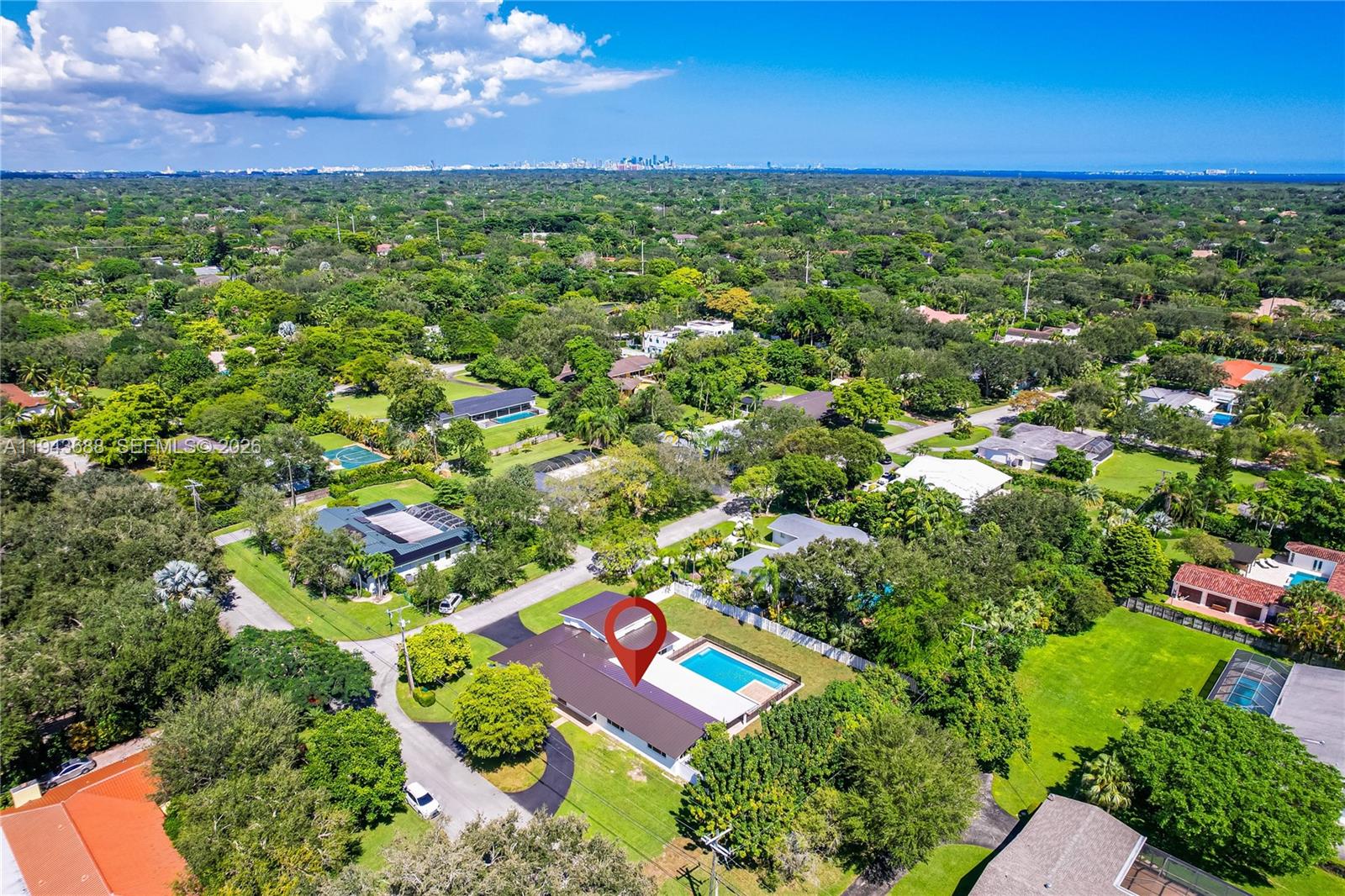 12525 Southwest 68th Court Pinecrest, FL 33156 - Photo 6 of 46 a view of a yard