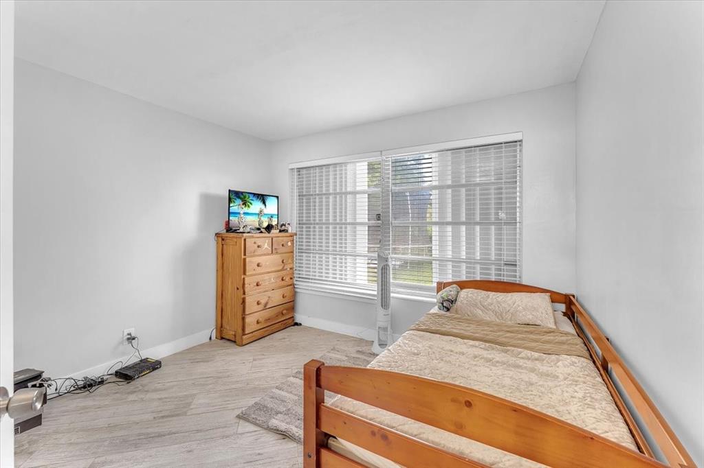 6621 Southwest 19th Street Pompano Beach, FL 33068 - Photo 12 of 16 an empty room with windows