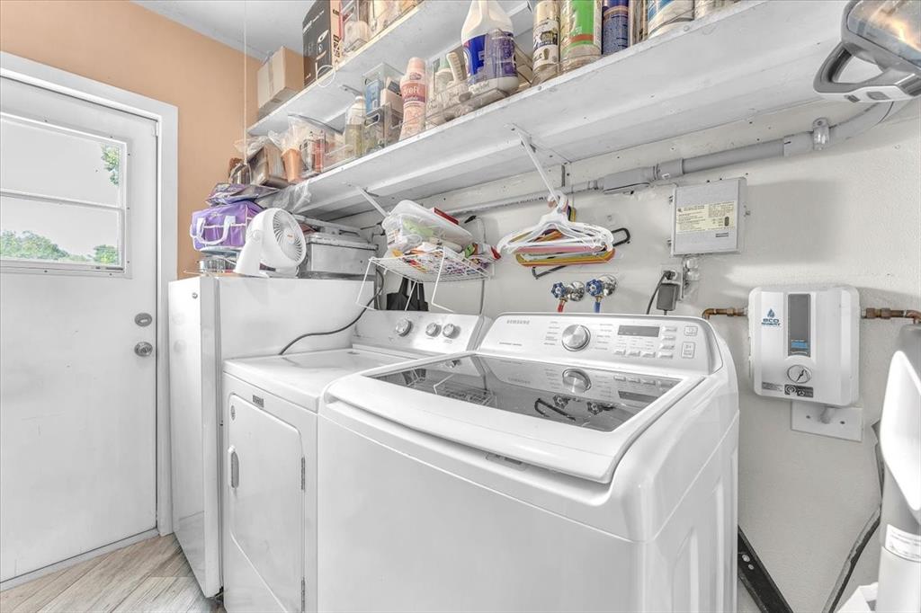 6621 Southwest 19th Street Pompano Beach, FL 33068 - Photo 13 of 16 a utility room with dryer and washer