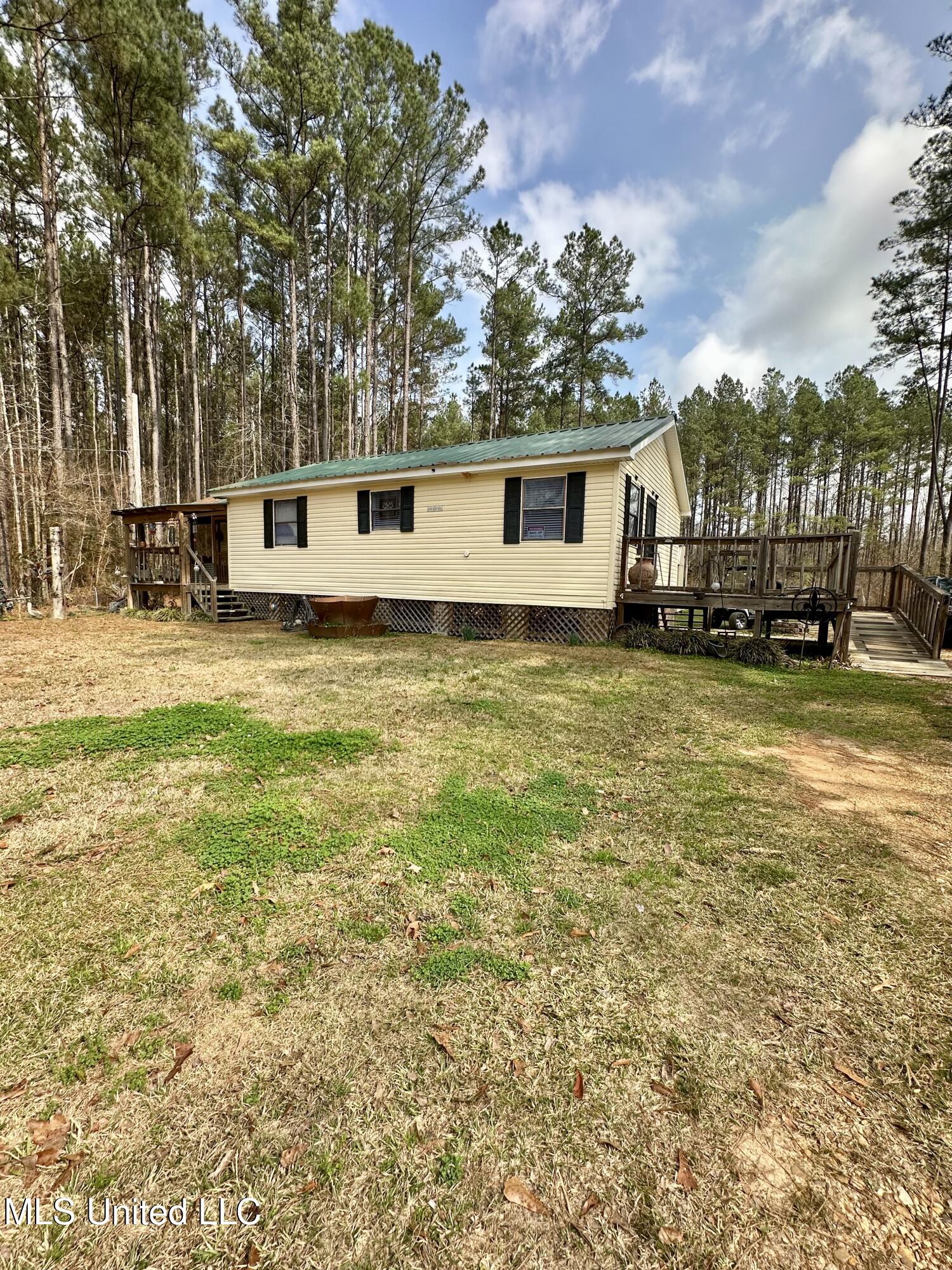 2062-2063 Lazy Creek Road Summit, MS 39666 - Photo 2 of 61 IMG_4656