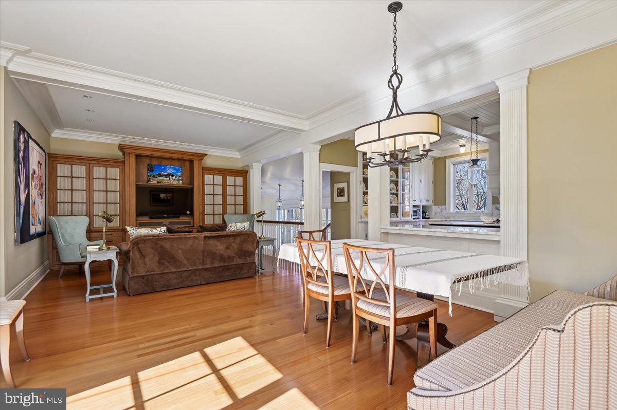 922 Rolandvue Road Baltimore, MD 21204 - Photo 22 of 89 a view of a dining room with furniture window and wooden floor