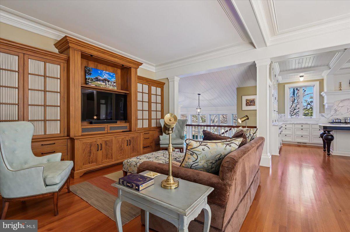 922 Rolandvue Road Baltimore, MD 21204 - Photo 23 of 89 a living room with furniture and a flat screen tv