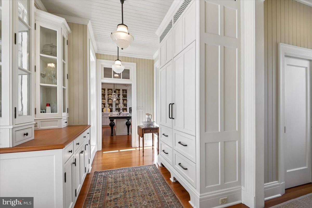 922 Rolandvue Road Baltimore, MD 21204 - Photo 27 of 89 a bathroom with a double vanity sink a mirror a bathtub and shower
