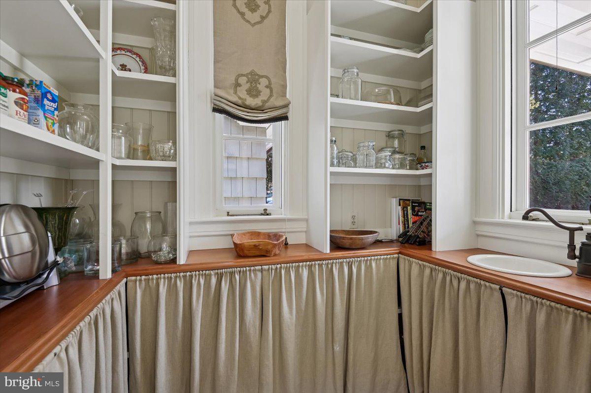 922 Rolandvue Road Baltimore, MD 21204 - Photo 28 of 89 a view of a two room with wooden floor and a window