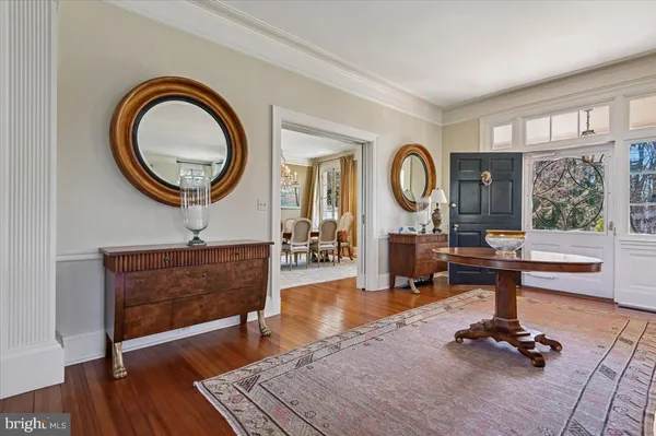 a view of a livingroom with furniture and a fireplace