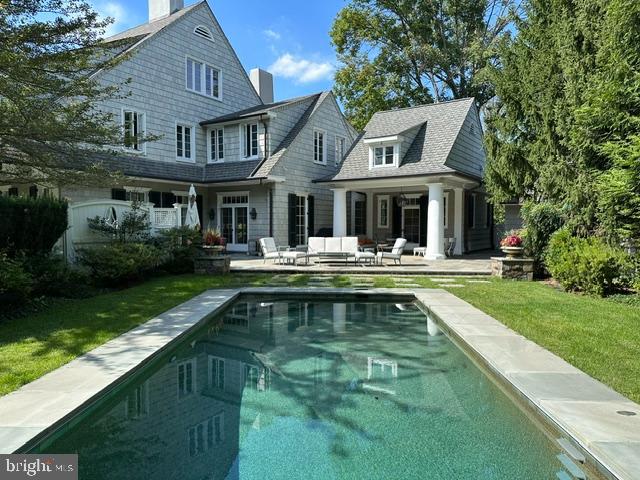 922 Rolandvue Road Baltimore, MD 21204 - Photo 71 of 89 a front view of a house with swimming pool and chairs