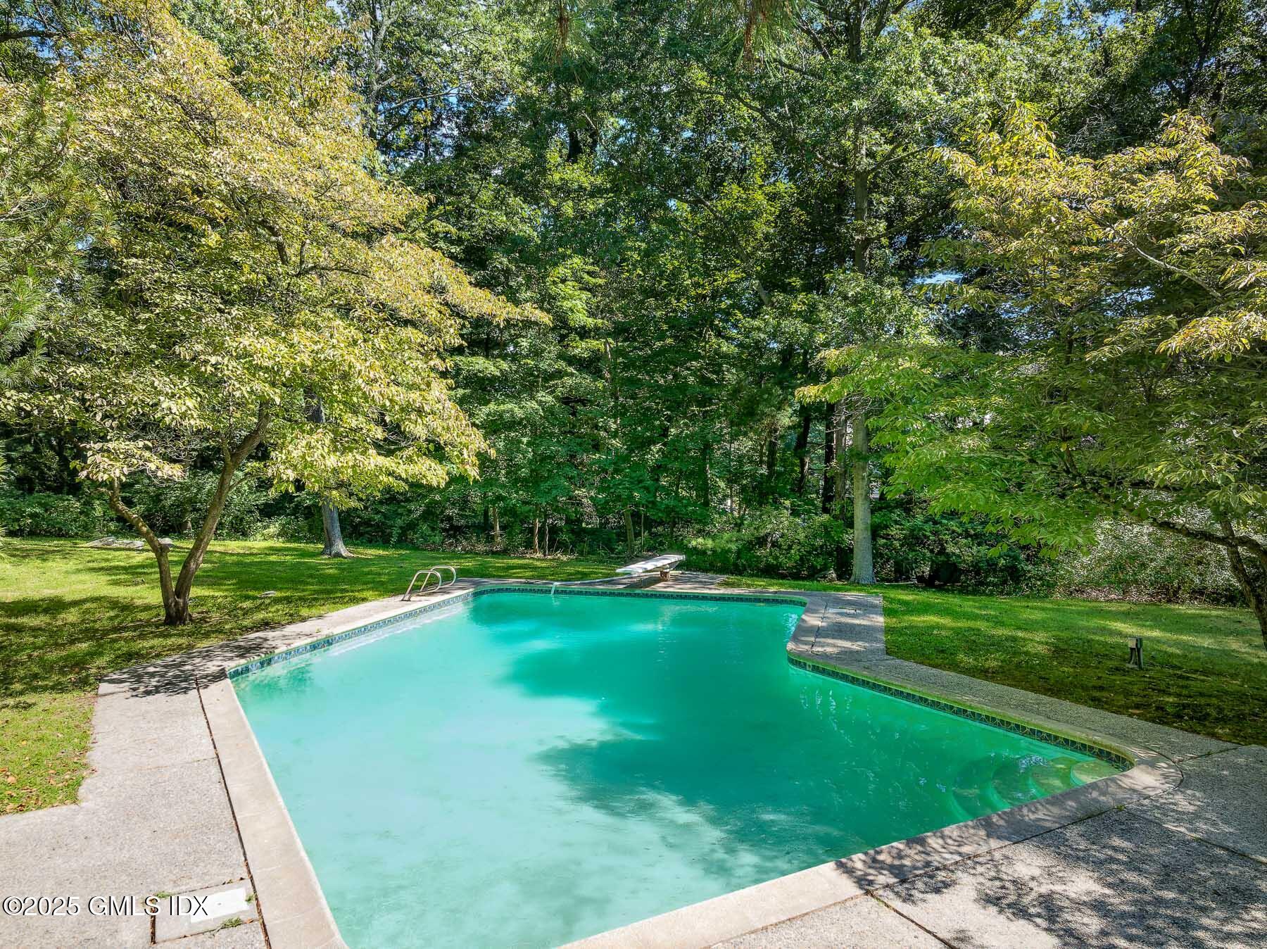 267 Riversville Road Greenwich, CT 06831 - Photo 18 of 23 a view of a golf course with a park