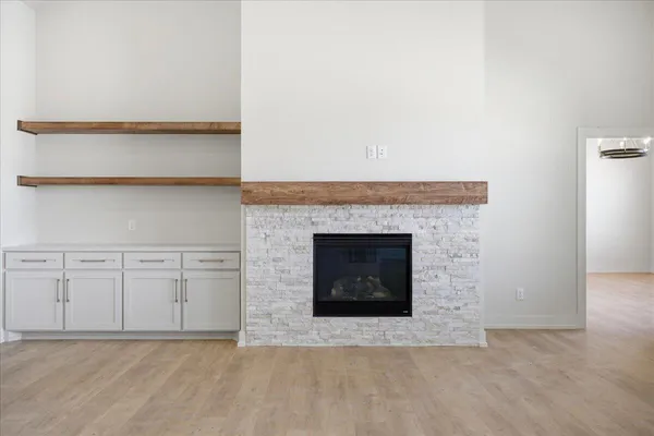 a view of a livingroom with a fireplace