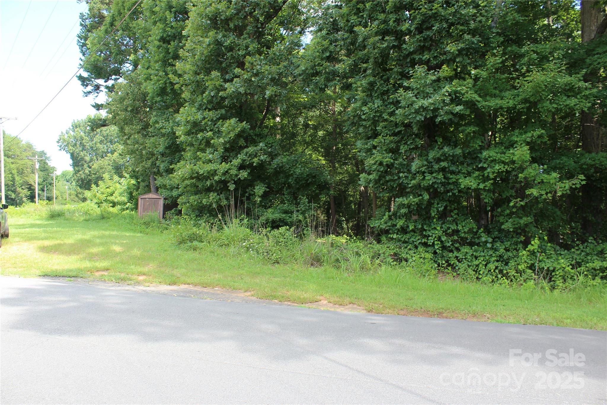 7220 Little Mountain Road Sherrills Ford, NC 28673 - Photo 8 of 10 a view of a road with a yard
