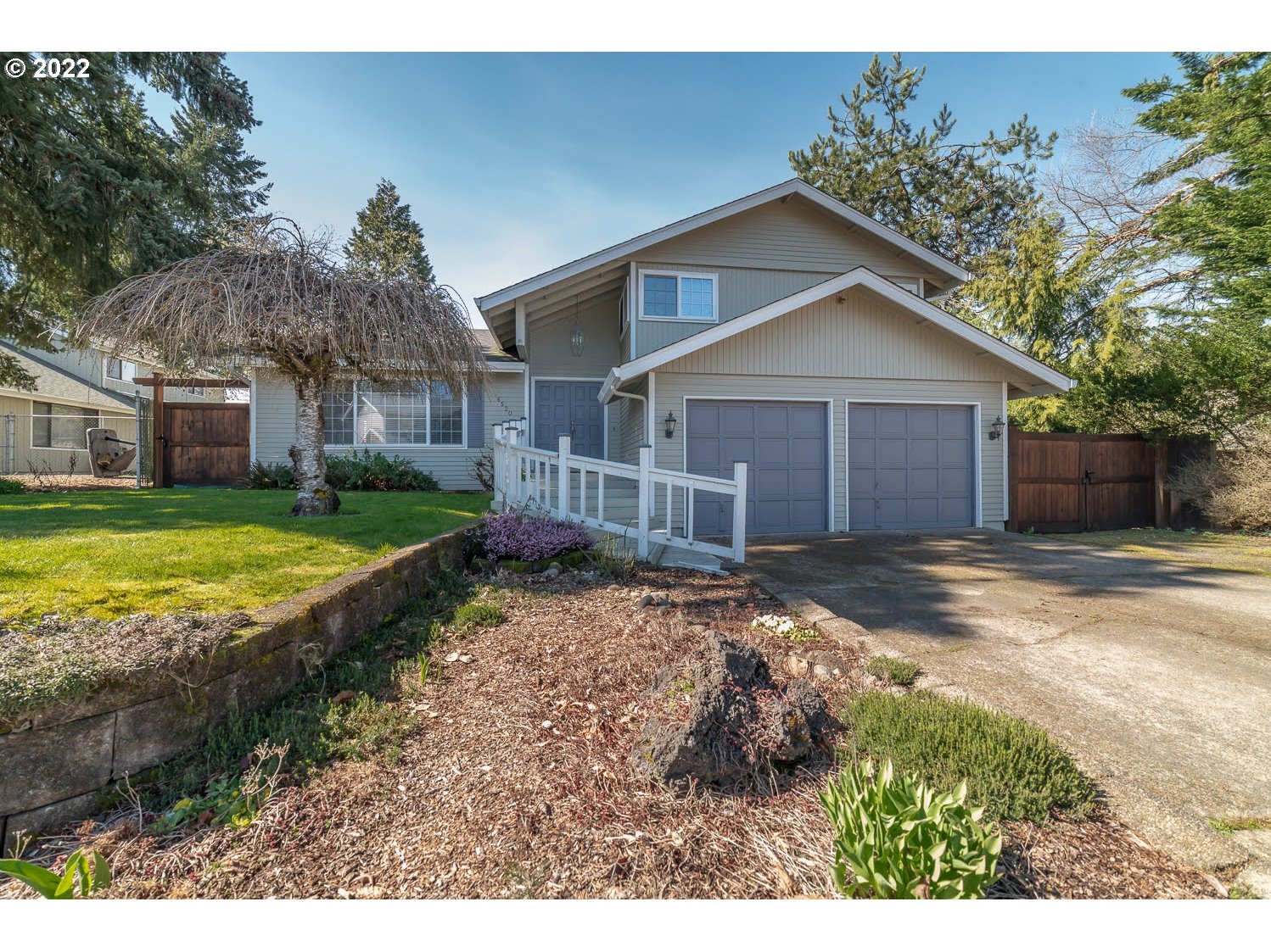 6520 E Street Springfield, OR 97478 - Photo 1 of 32 a view of a house with a yard