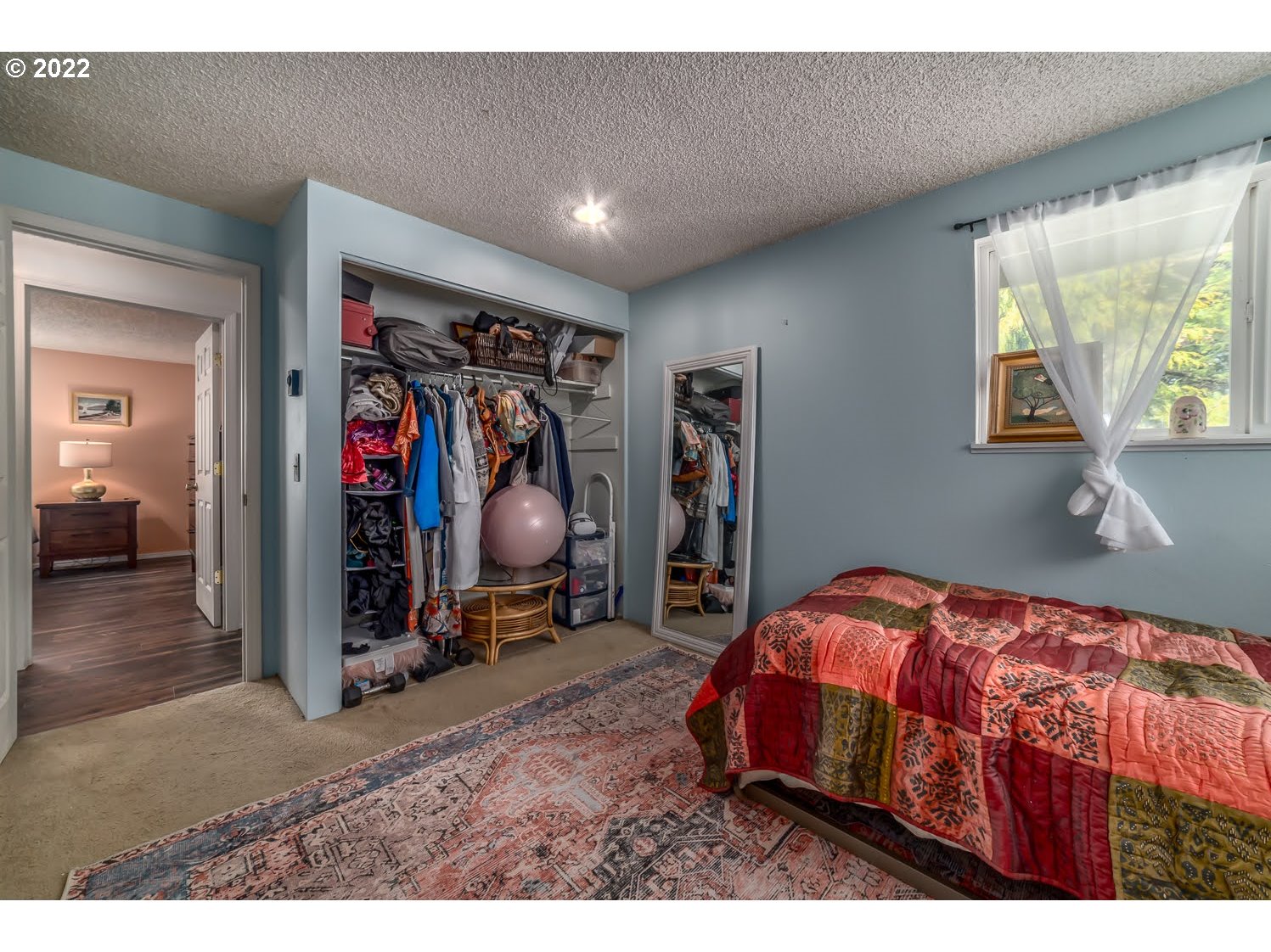 6520 E Street Springfield, OR 97478 - Photo 21 of 32 a bedroom with furniture and a closet