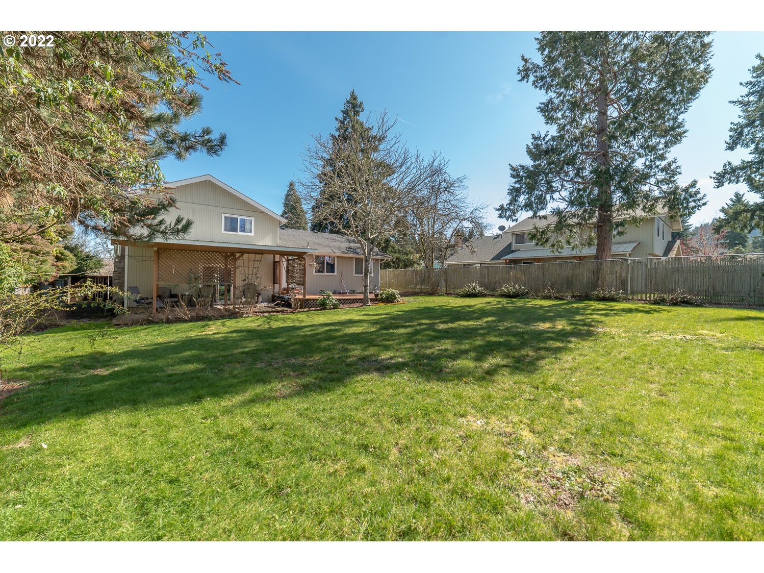 6520 E Street Springfield, OR 97478 - Photo 32 of 32 a front view of house with yard and trees in the background