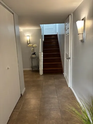 a view of entryway and hall with a window