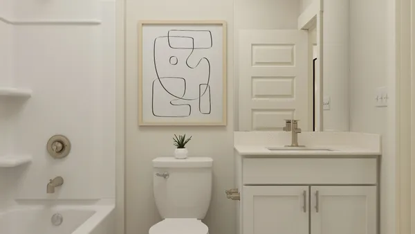 a bathroom with a sink a toilet and a bathtub