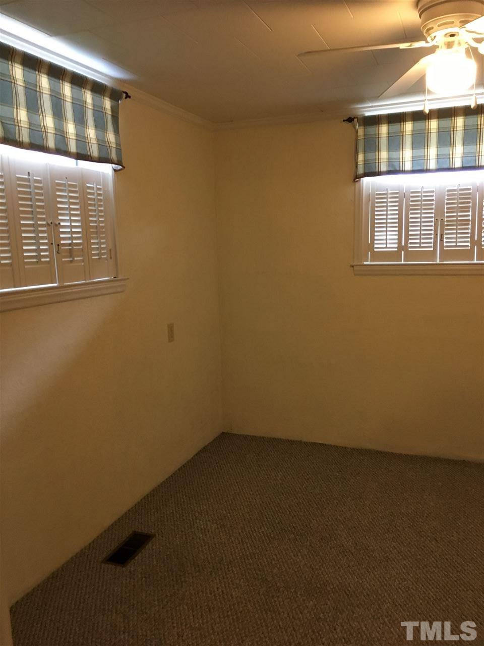 31 Service Road Roxboro, NC 27574 - Photo 13 of 18 a view of an empty room with a window