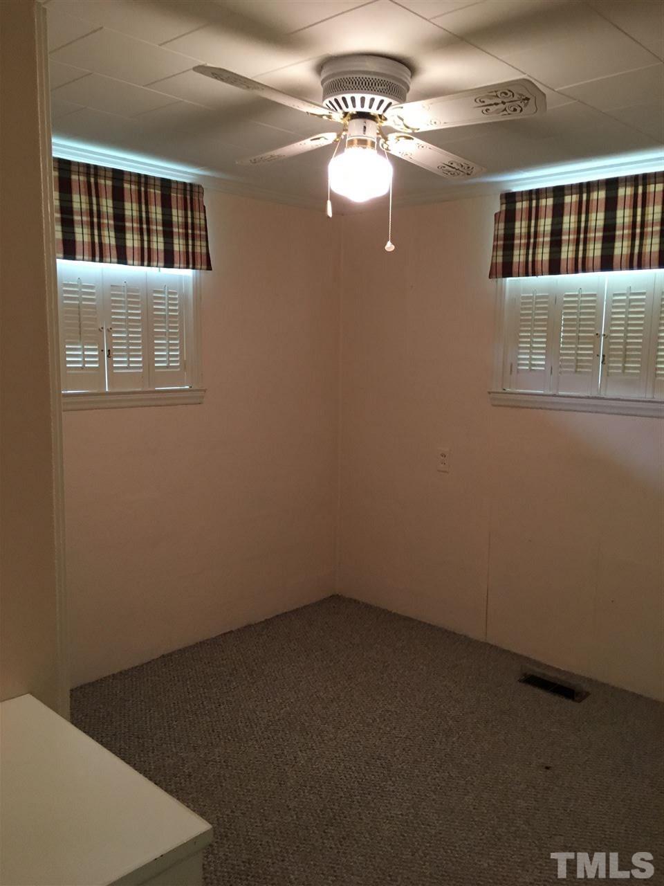 31 Service Road Roxboro, NC 27574 - Photo 15 of 18 a view of an empty room with a window