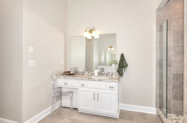 a room with closet and a ceiling fan