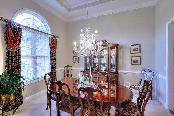 a kitchen with stainless steel appliances granite countertop a stove and a sink