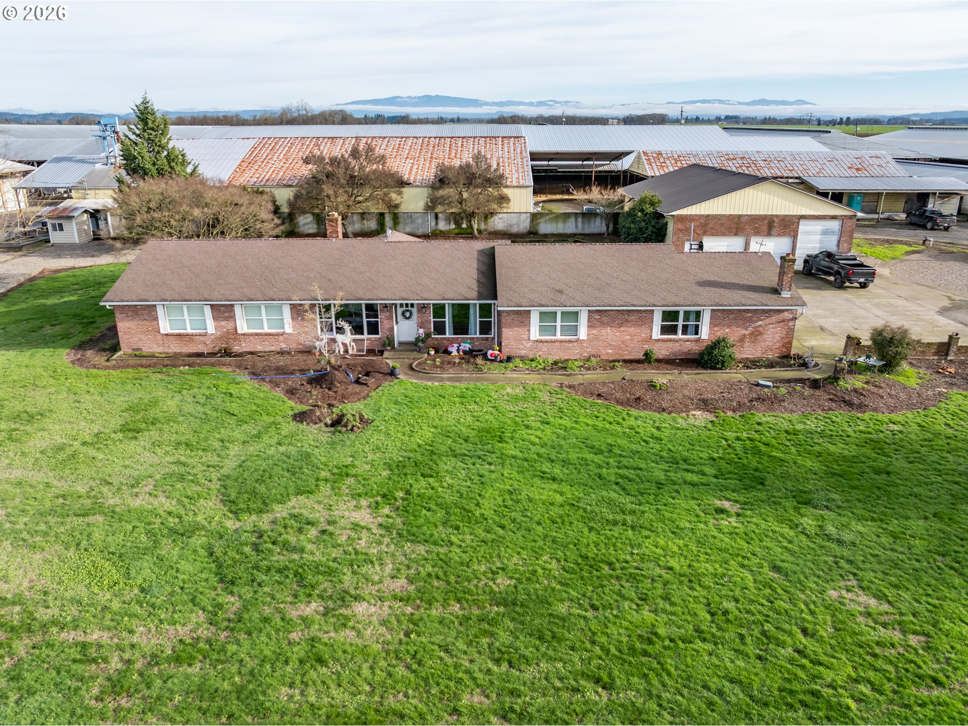 35725 Engel Road Southeast Albany, OR 97322 - Photo 35 of 38 an aerial view of a house with a garden and lake view
