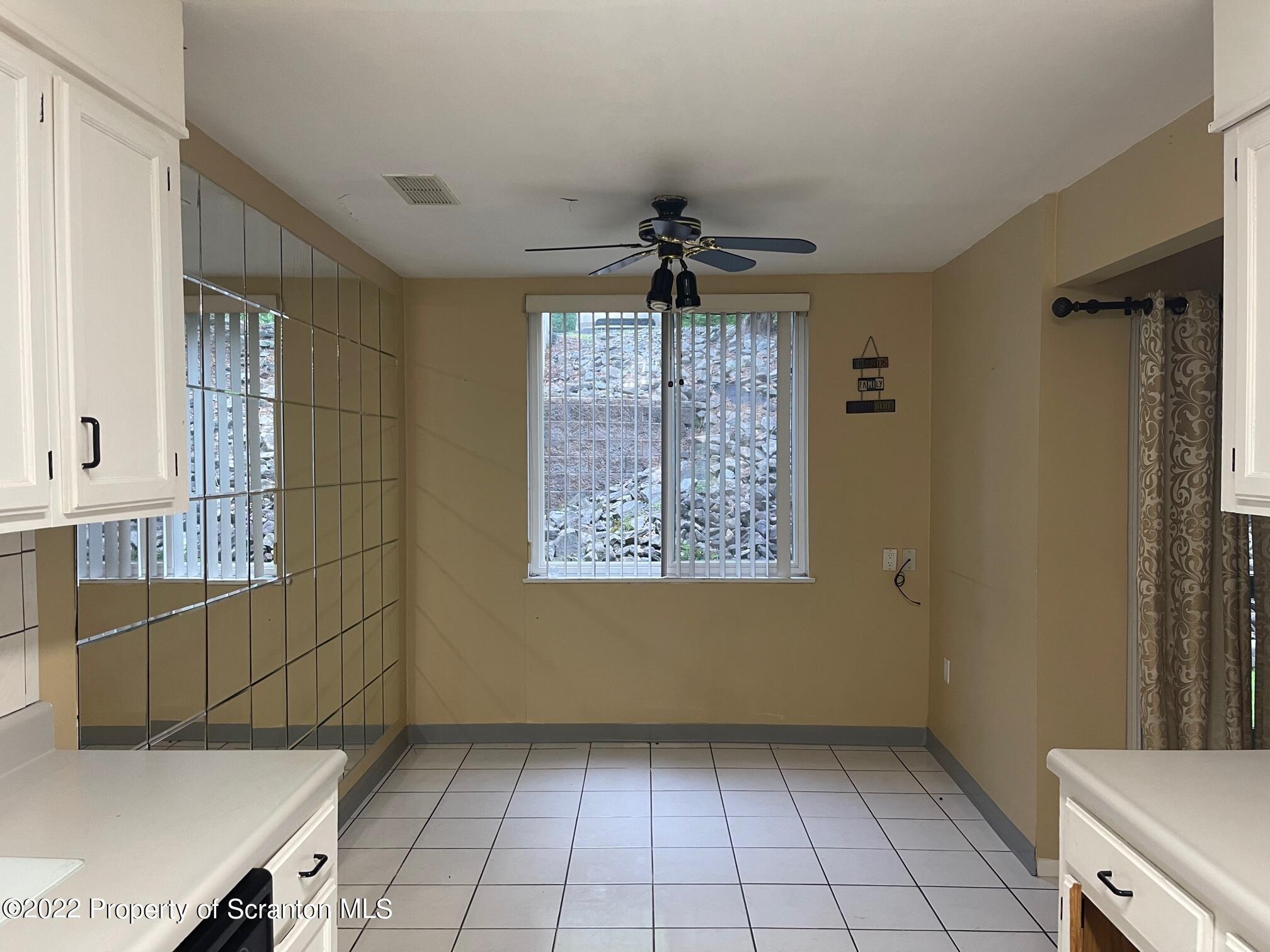 1501 Summit Pointe Scranton, PA 18508 - Photo 3 of 12 a view of an empty room with a window