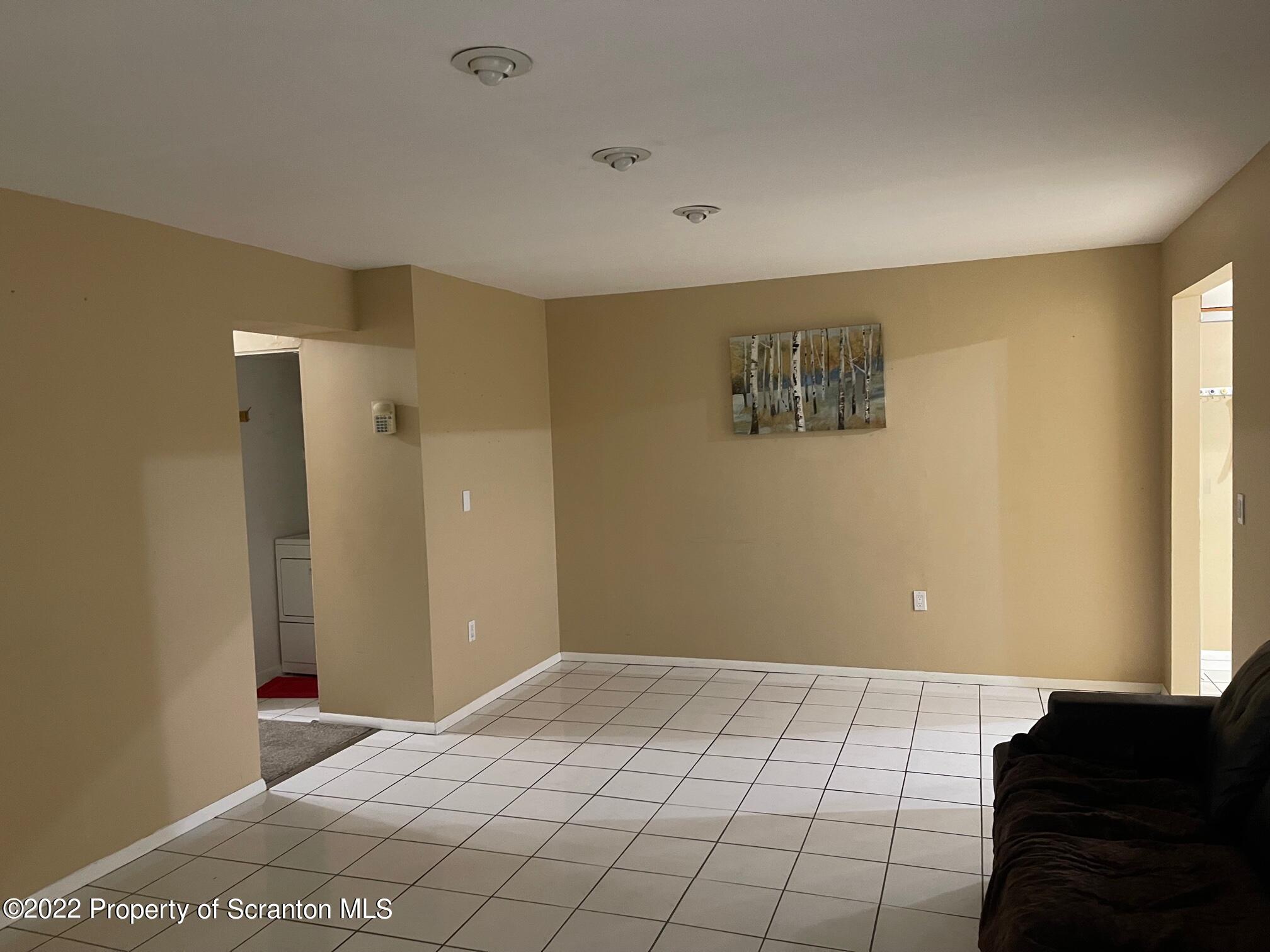 1501 Summit Pointe Scranton, PA 18508 - Photo 5 of 12 a view of a room with an empty space and a window