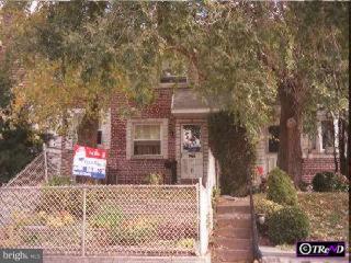 905 Grant Road Folcroft, PA 19032 - Photo 1 of 1 a front view of a house with a yard