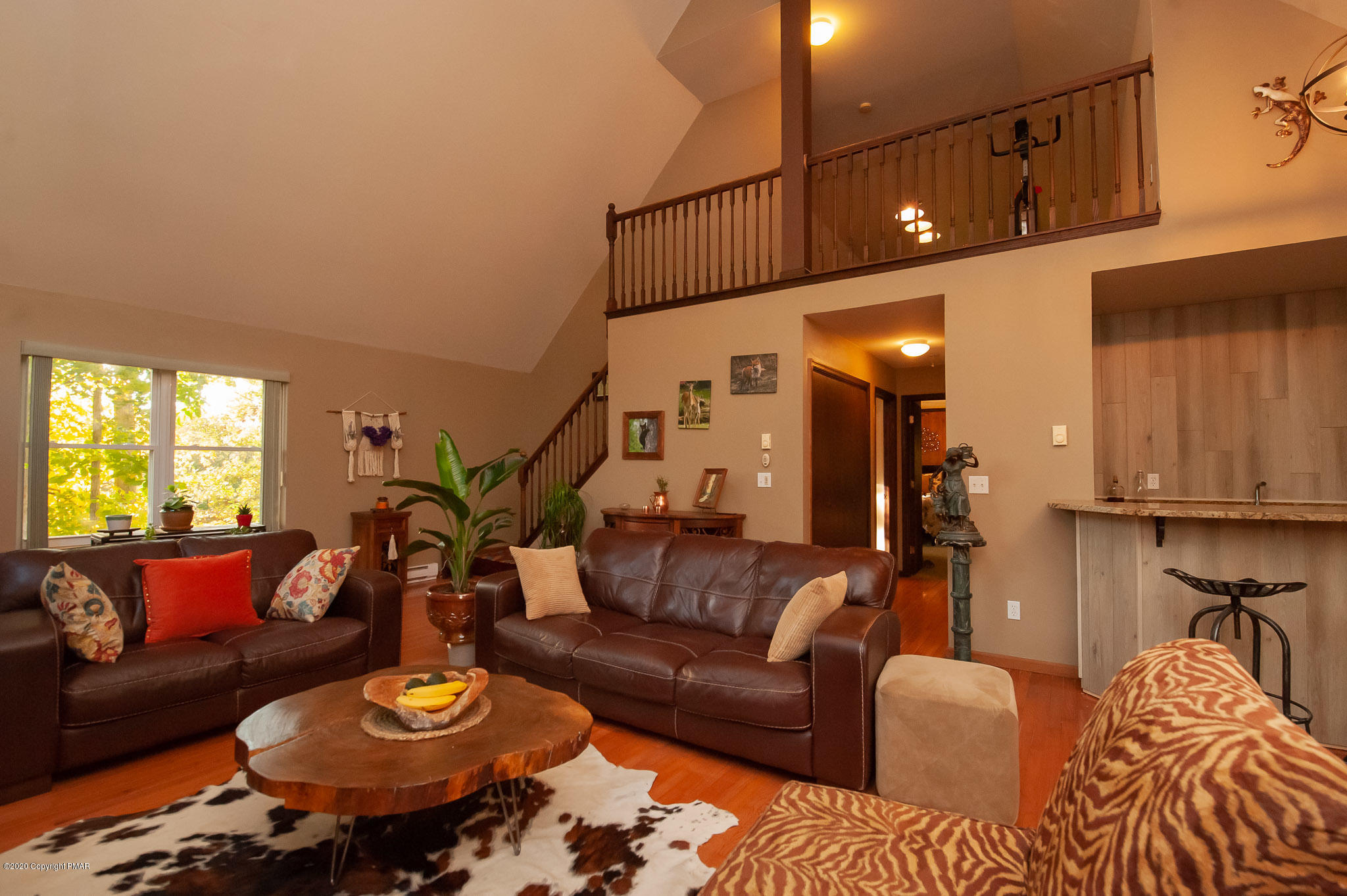 145 Salisbury Road Bushkill, PA 18324 - Photo 28 of 60 a living room with furniture and a wooden floor