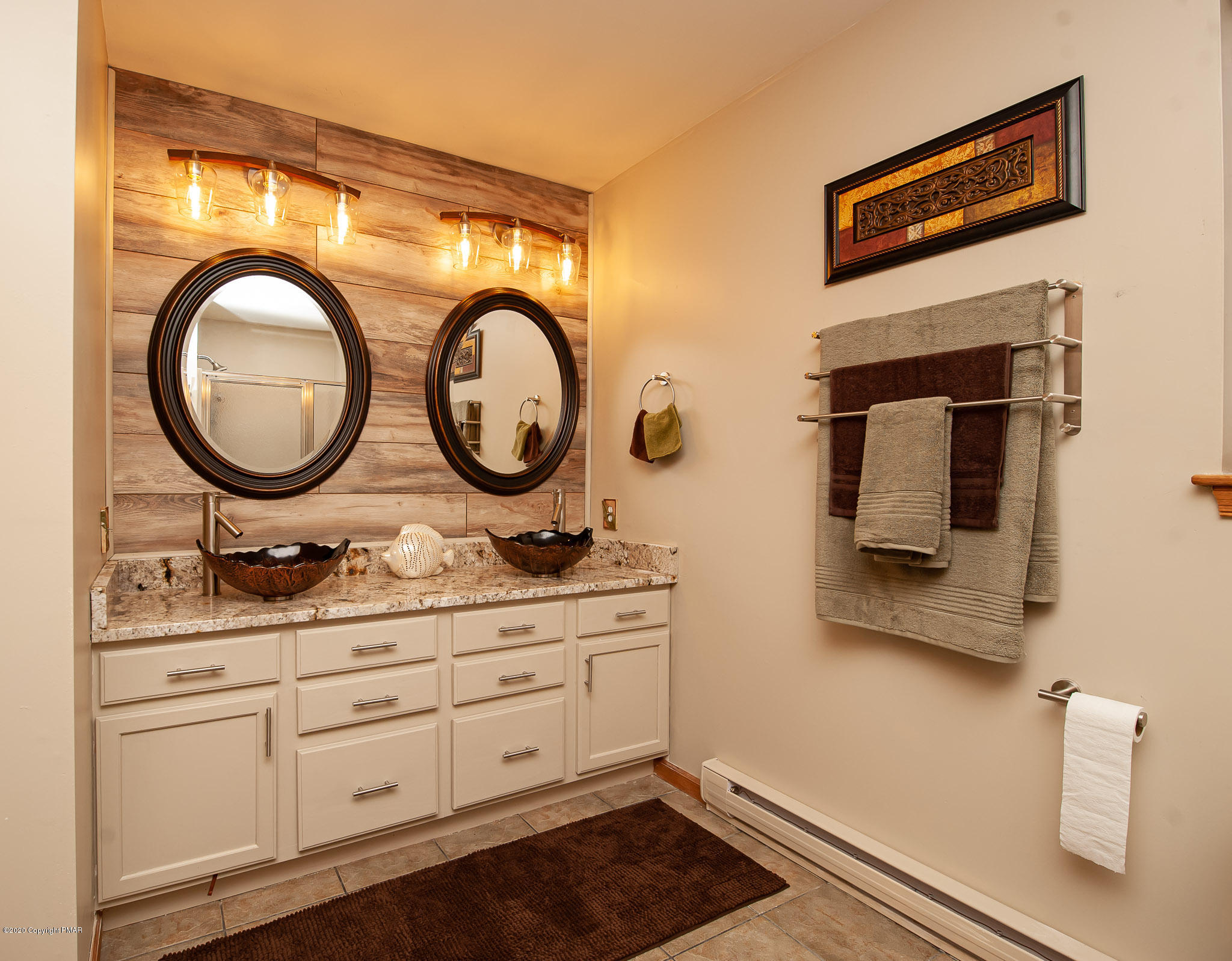 145 Salisbury Road Bushkill, PA 18324 - Photo 37 of 60 a bathroom with a sink and a mirror