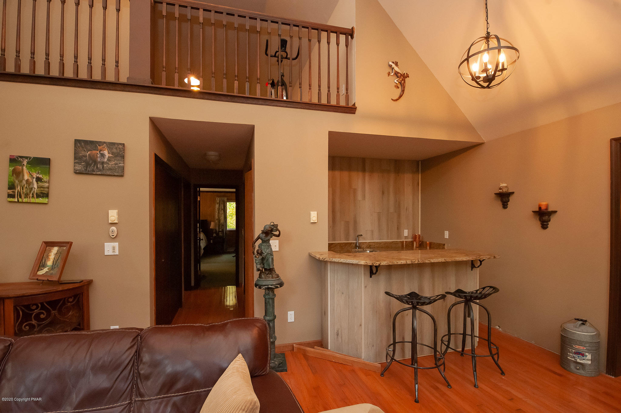 145 Salisbury Road Bushkill, PA 18324 - Photo 45 of 60 a view of a dining room with furniture and wooden floor