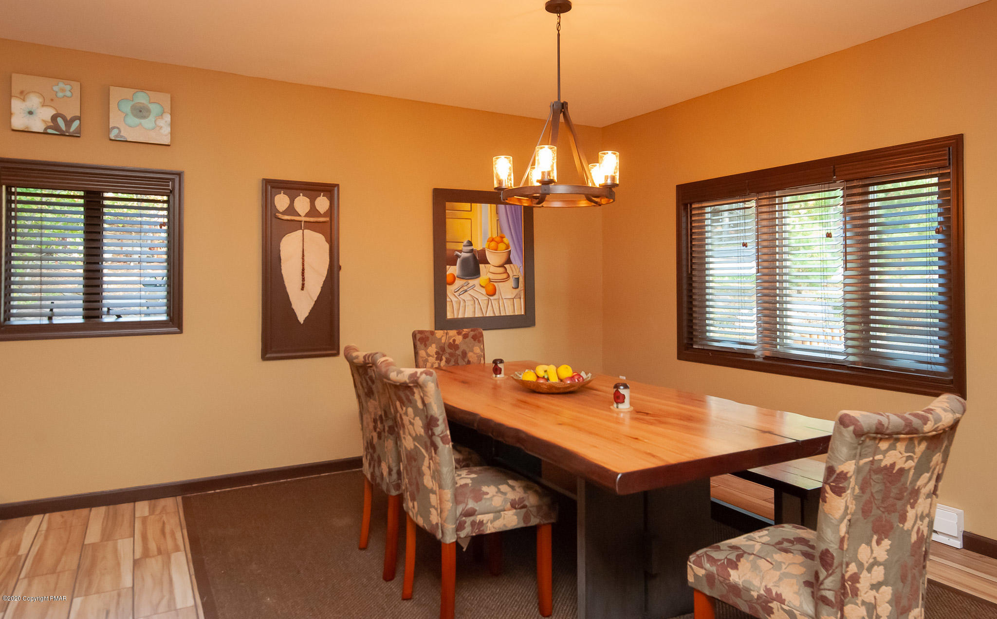 145 Salisbury Road Bushkill, PA 18324 - Photo 10 of 60 a view of a dining room with furniture window and wooden floor