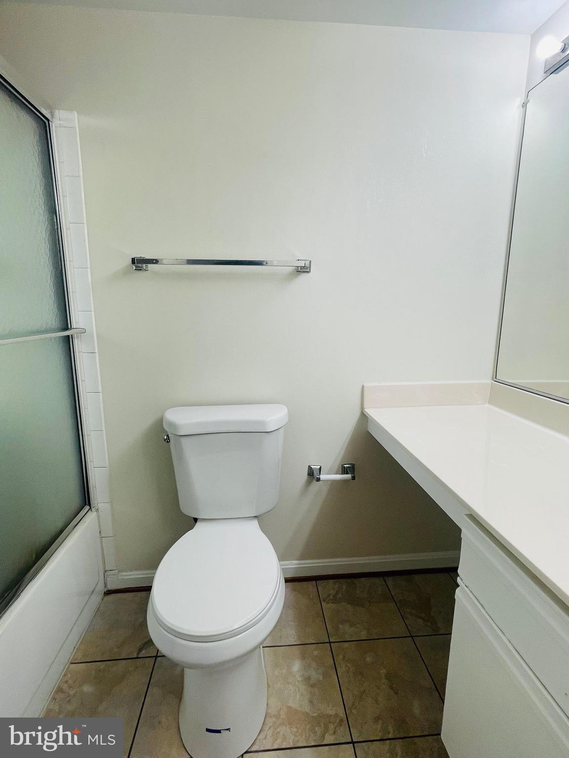 14229 Bowsprit Lane, Unit 501 Laurel, MD 20707 - Photo 15 of 19 a bathroom with a toilet and a sink