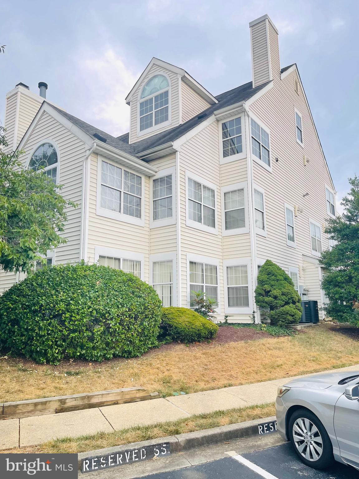 14229 Bowsprit Lane, Unit 501 Laurel, MD 20707 - Photo 19 of 19 a front view of a house with parking space