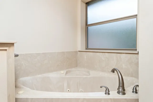 a bathroom with a bathtub