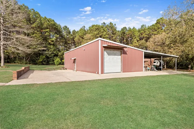 a view of a backyard of the house