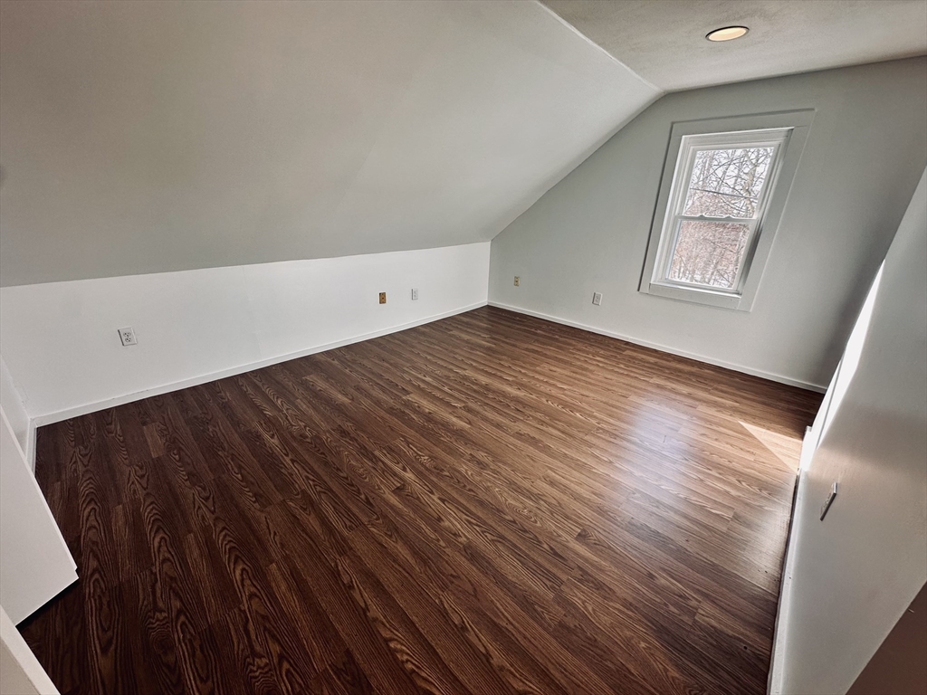 12 Thorndike Street, Unit 2 Salem, MA 01970 - Photo 13 of 16 a view of an empty room and wooden floor