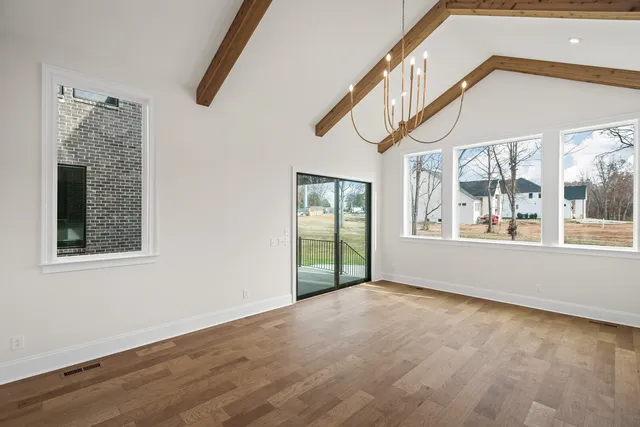 a spacious bathroom with a double vanity sink mirror and double