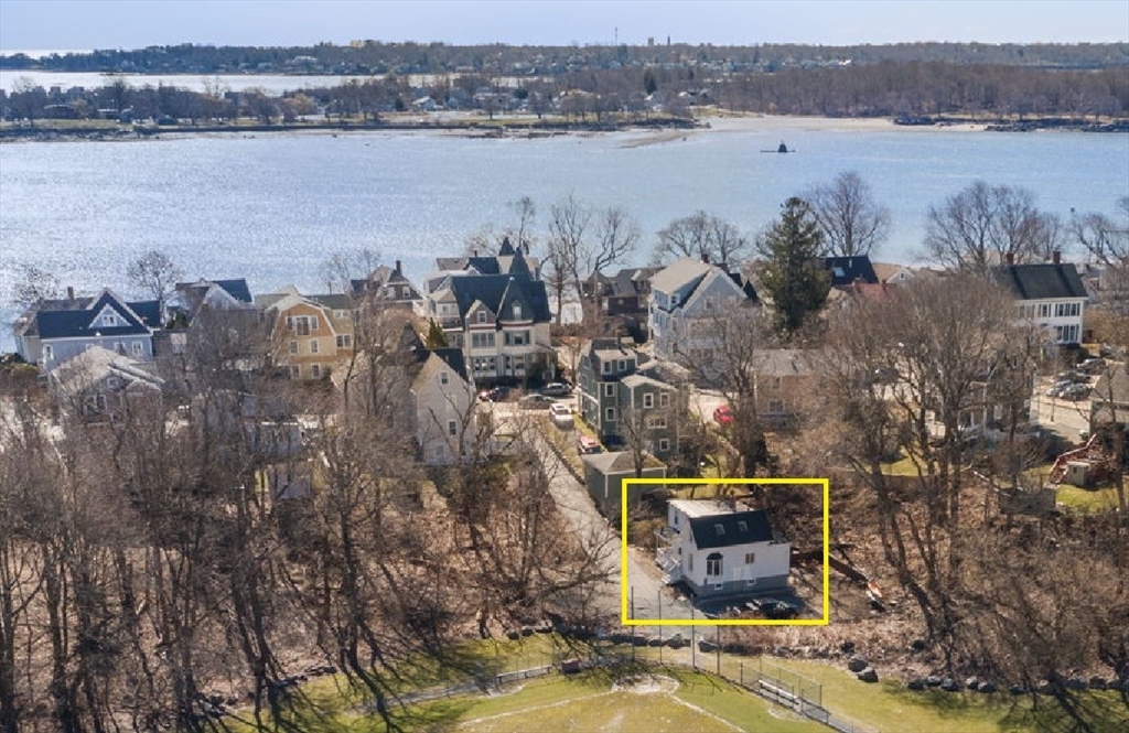 a aerial view of a house with lake view