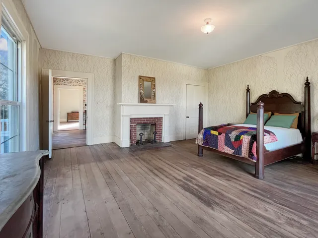 a view of a backyard of the house