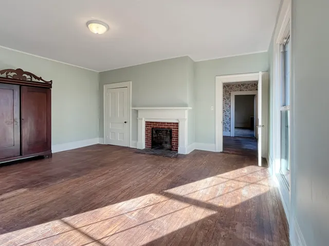 a view of outdoor space with green field and trees