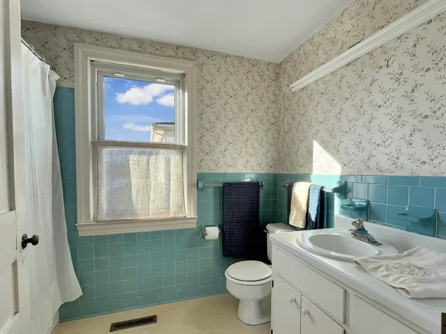 a view of lake with a yard