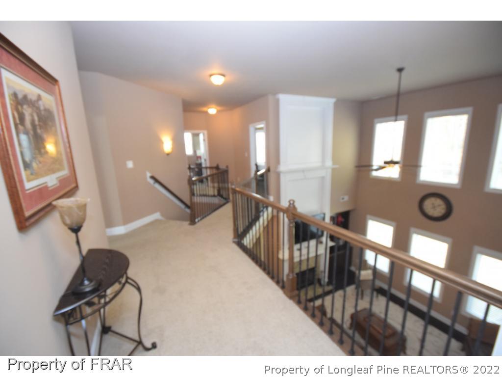 1804 Micahs Way North Spring Lake, NC 28390 - Photo 16 of 30 a view of a livingroom with furniture and windows