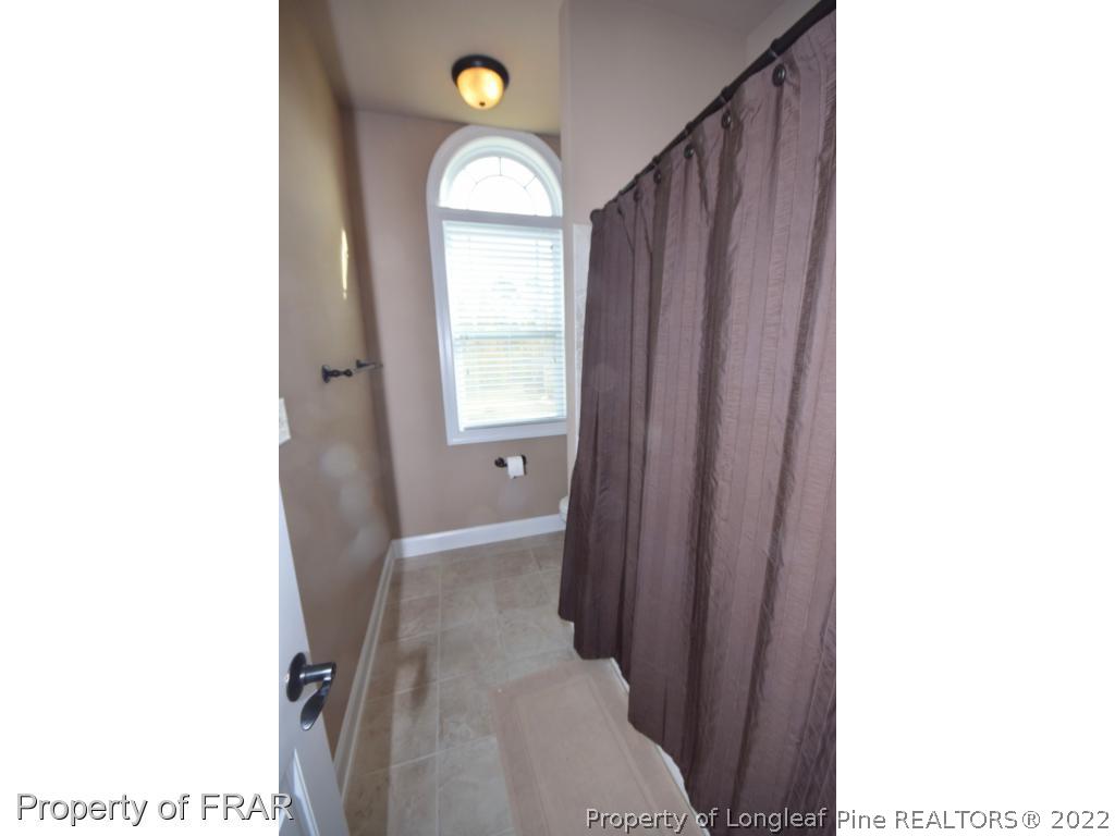 1804 Micahs Way North Spring Lake, NC 28390 - Photo 19 of 30 a view of livingroom with hardwood floor and window