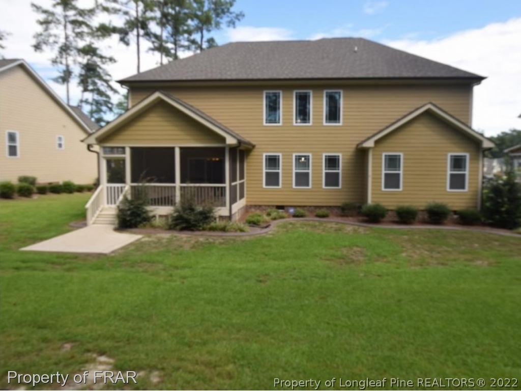 1804 Micahs Way North Spring Lake, NC 28390 - Photo 3 of 30 a front view of house with yard and green space