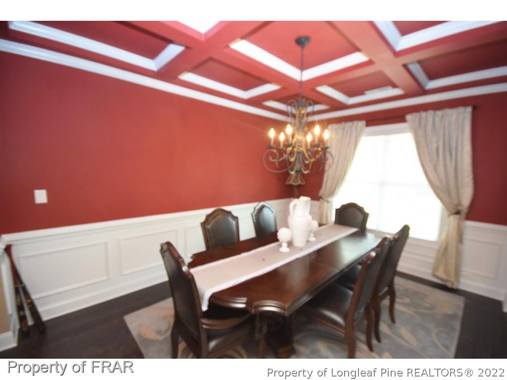 1804 Micahs Way North Spring Lake, NC 28390 - Photo 5 of 30 a dining room with furniture and window