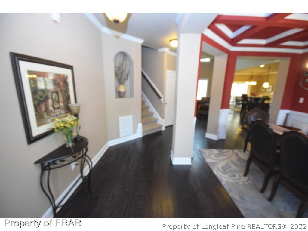 1804 Micahs Way North Spring Lake, NC 28390 - Photo 7 of 30 a view of a livingroom with furniture and hardwood floor