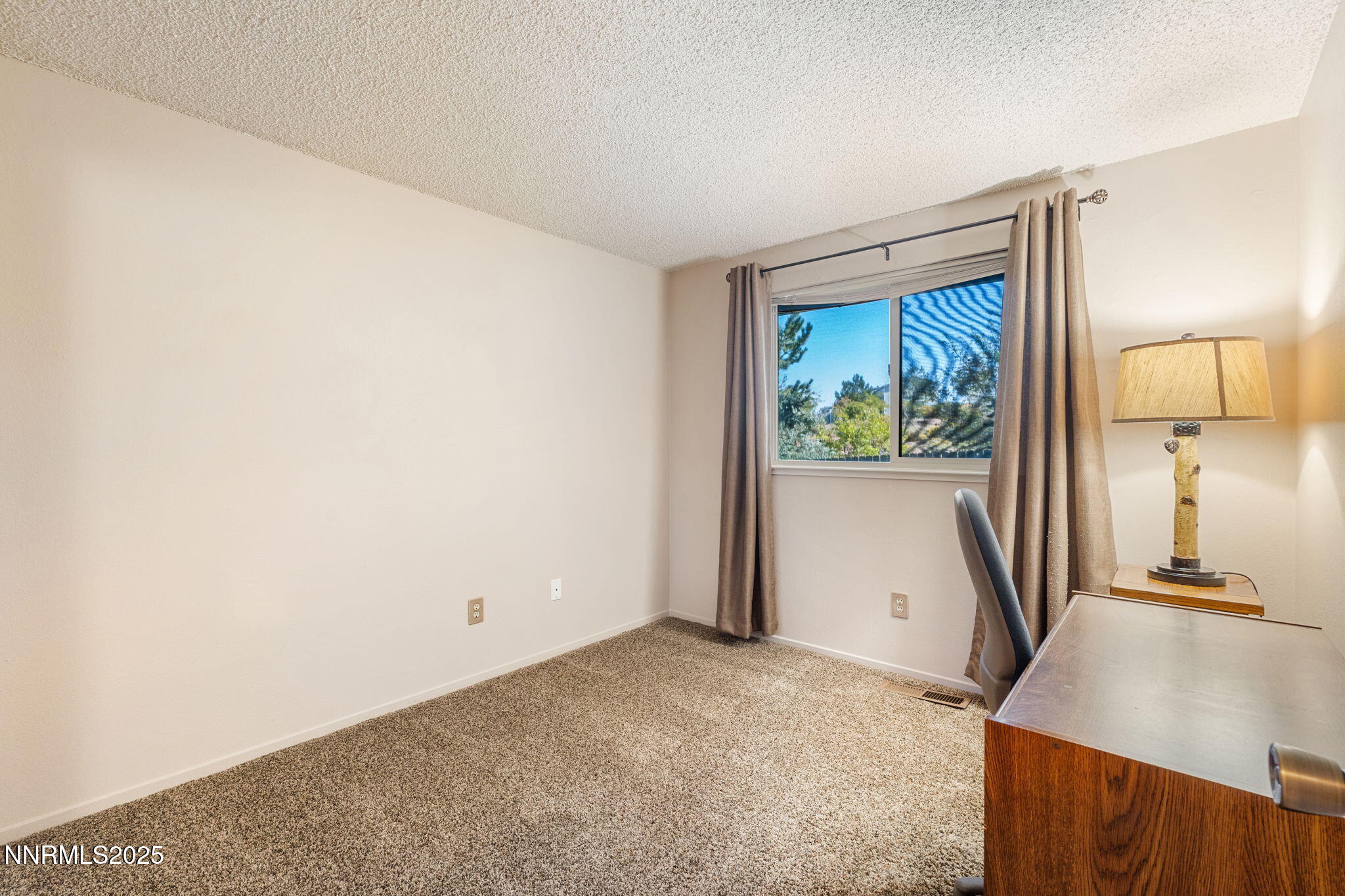 8678 Strutter Way Reno, NV 89506 - Photo 28 of 38 a view of a room with a sink