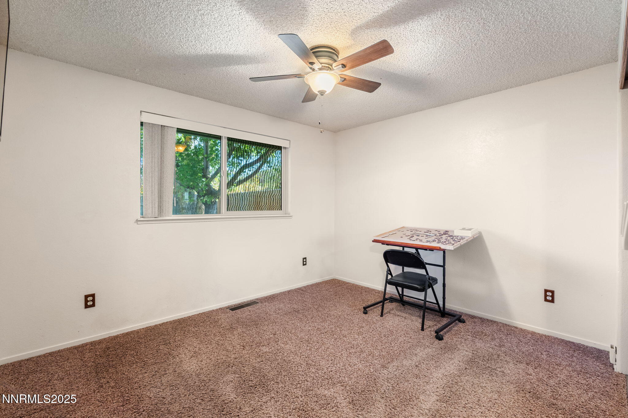 8678 Strutter Way Reno, NV 89506 - Photo 29 of 38 a view of workspace with windows